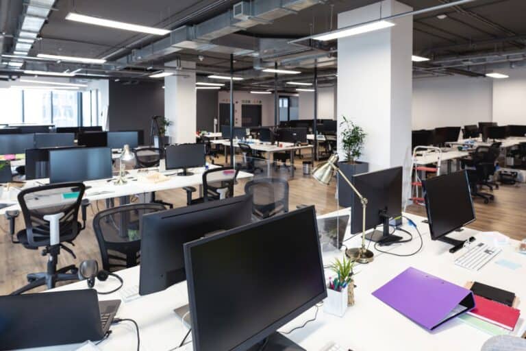 An office filled with computers in the concept of 'How to Pack Office IT Equipment and Electronics'.